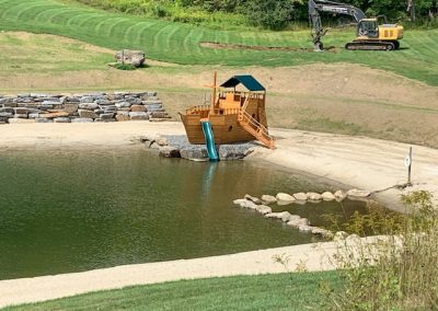 pirate ship slide in pond